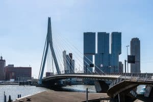 Iconic Skyscraper And Bridge Against Sky In Rotterdam
